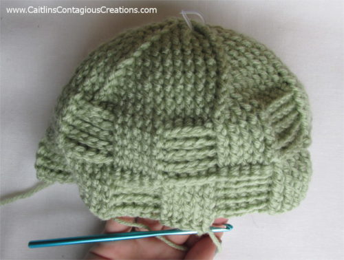 Beginner friendly free crochet hat pattern. Spiral Star Basket Weave winter cap is warm and thick to wear and fun and quick to crochet! Enjoy, from Caitlin's Contagious Creations.