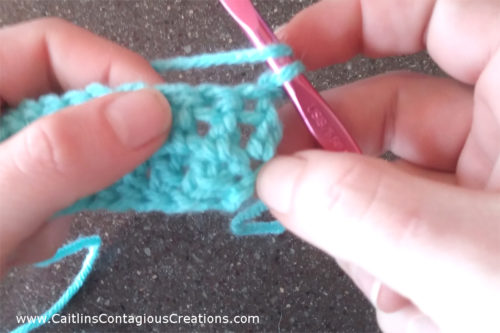 A front and back post crochet stitch photo tutorial from Caitlin's Contagious Creations. Learn a front post double crochet FPDC and back post double crochet BPDC with this free, easy step-by-step crochet lesson stitch guide with pictures. This basic crochet stitch is a must know for beginners!
