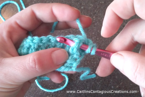 A front and back post crochet stitch photo tutorial from Caitlin's Contagious Creations. Learn a front post double crochet FPDC and back post double crochet BPDC with this free, easy step-by-step crochet lesson stitch guide with pictures. This basic crochet stitch is a must know for beginners!
