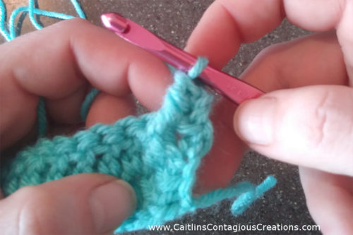 A front and back post crochet stitch photo tutorial from Caitlin's Contagious Creations. Learn a front post double crochet FPDC and back post double crochet BPDC with this free, easy step-by-step crochet lesson stitch guide with pictures. This basic crochet stitch is a must know for beginners!