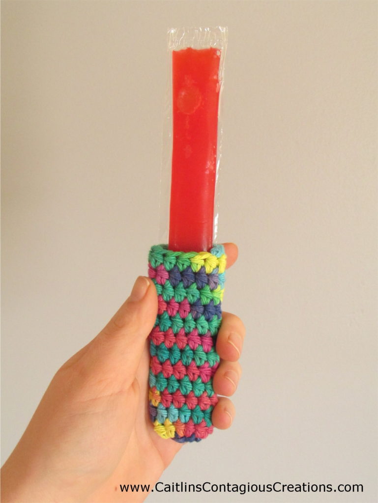 FREE Ice Pop Cozy Crochet Pattern. A fast and beginner friendly freeze popsicle holder crochet design with written directions and photos! Grab your cotton yarn and make yours today!