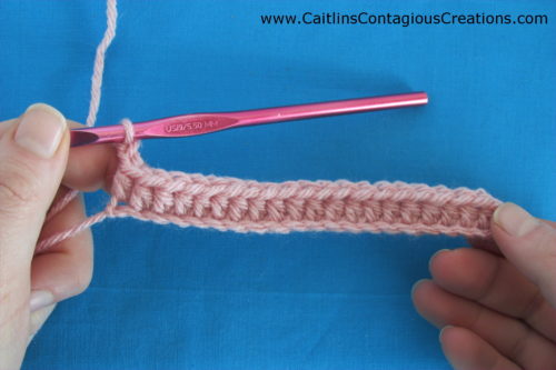 Half Double Crochet Stitch Tutorial from Caitlin's Contagious Creations. It is a beginner level, basic crochet skill needed for many crochet patterns. This photo instruction post with written directions and pictures is a simple lesson to complete the half double crochet.