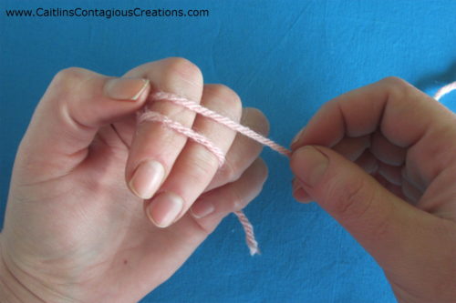 wrap yarn around back of fingers a second time