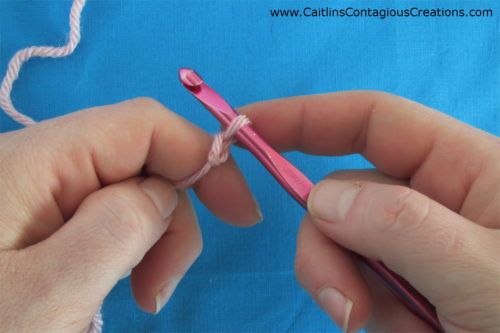 Slide stitch down to the shank of the hook to create proper chain stitch size