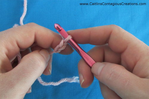 slide stitch down to shaft of hook to make completed chain stitch the proper size