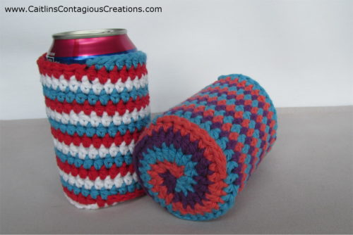 2 spiral can cozies, bottom spiral showing on grey and white background