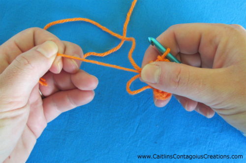 hold stitches firmly and pull on yarn tail to tighten magic circle
