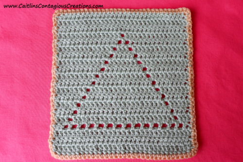 Triangle Shape Filet Square Crochet Pattern with contrasting color border.