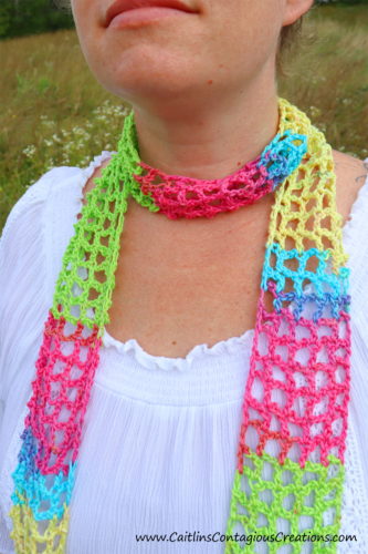 completed summer scarf crochet pattern on model